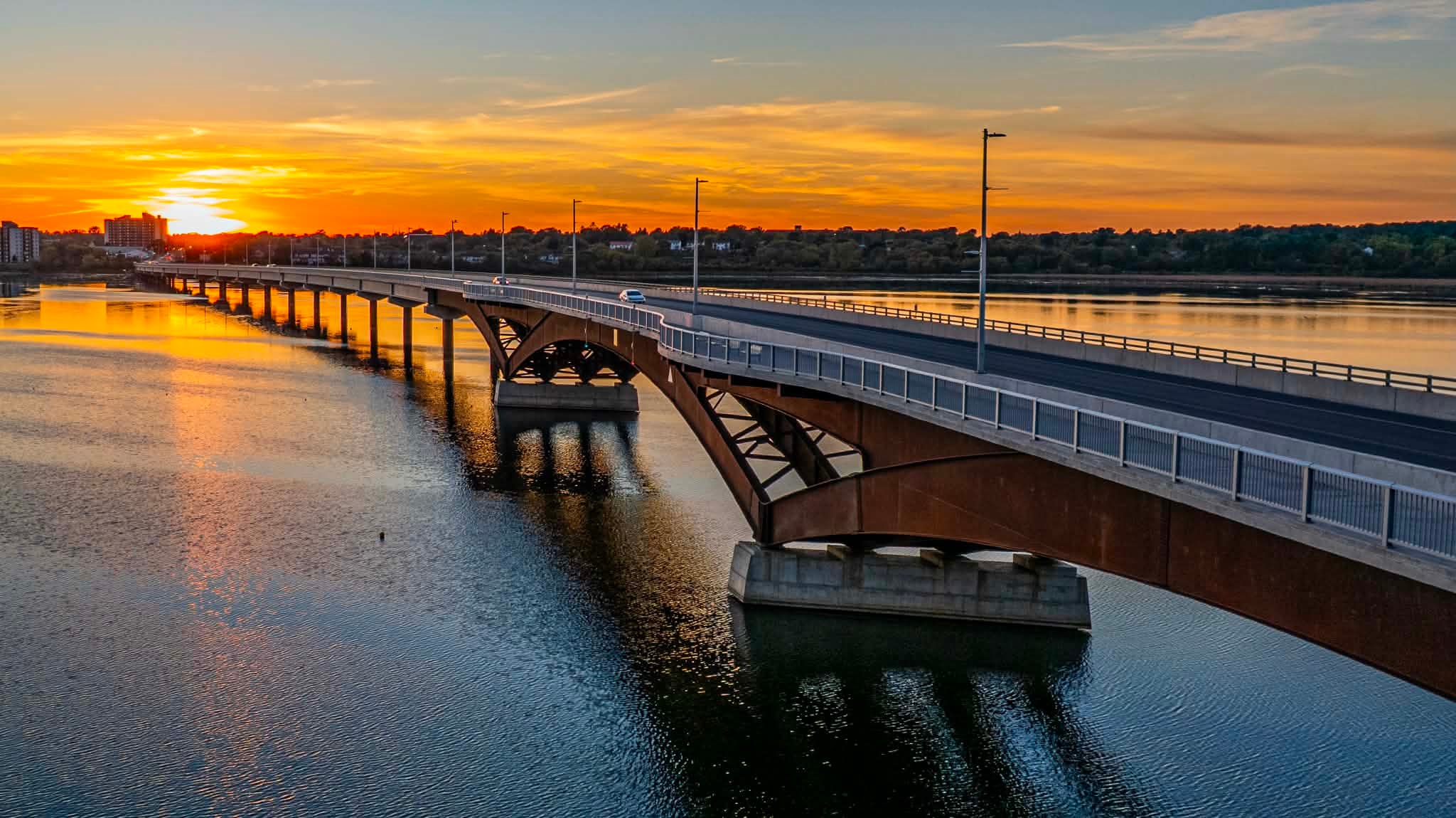 Bridge over the river at sunset
